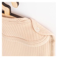 Dziecięcy śliniak New Baby Practical beżowy