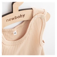 Niemowlęce bawełniane śpiochy New Baby Practical beżowy