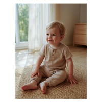 Dziecięcy muślinowy zestaw koszulka i spodnie New Baby beige